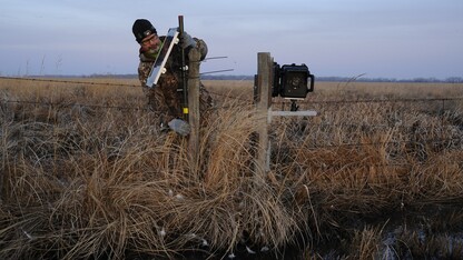 One of the cameras used for the Platte Basin Timelapse project is moved into place. Project coordinators Mike Forsberg and Mike Farrell will discuss the project at 7 p.m. Dec. 3 in Hardin Hall.