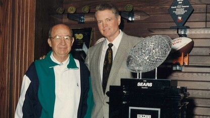 Elvin "Al" Papik with Tom Osborne. Papik, who served for nearly three decades in leadership roles with Admissions and Athletics, died May 7. He was 95.