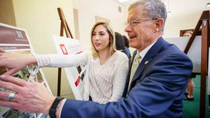 Sen. John S. McCollister and Amanda VanBuren discuss her research on the design of outpatient healthcare facilities.