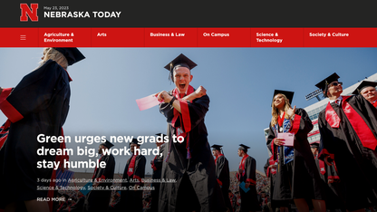 Screenshot of the front page of Nebraska Today, showing a grad celebrating earning his degree.