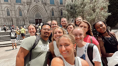 Valerie Uehling (center) takes a photo with her group in Spain.