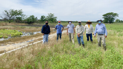 UNL researchers exploring suitable sites for deployment of the wireless-based sensor networks.