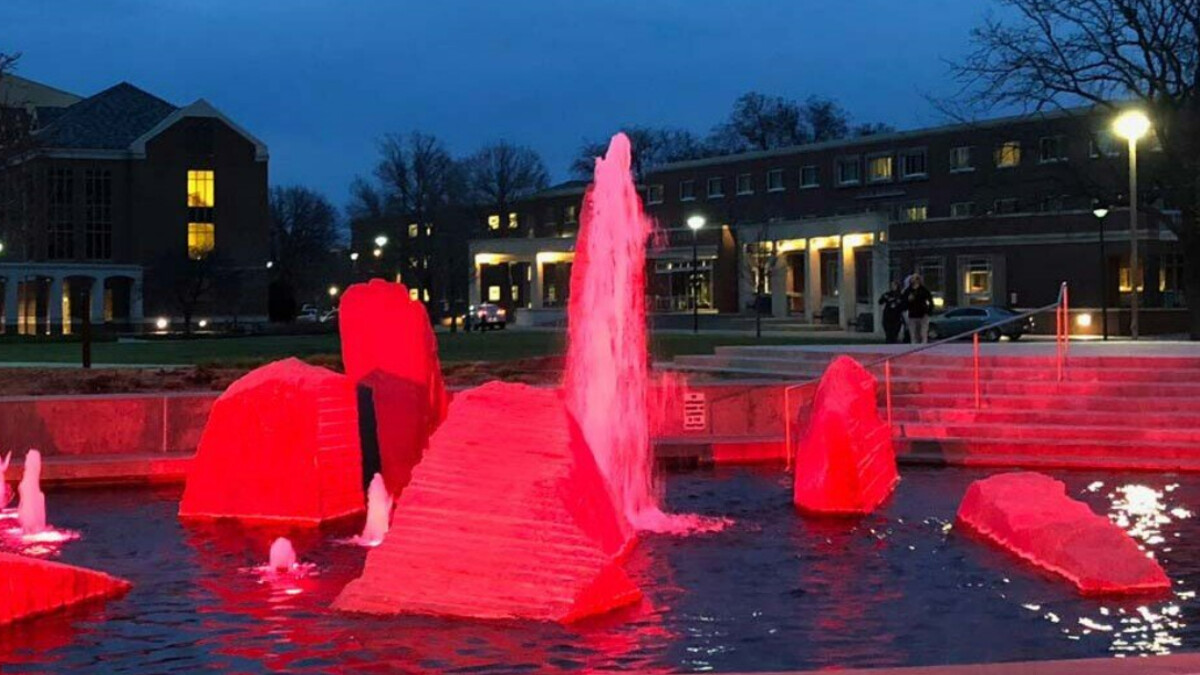 Lights illuminate the Broyhill Fountain red in honor of late UNL student, Keaton Klein.
