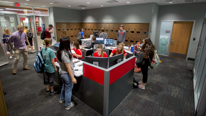 students checking in for exams at the digital learning commons