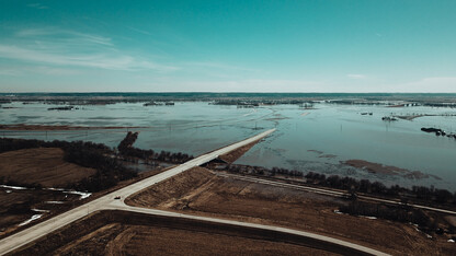 Floodwaters cover roadways near Bellevue last week. As floodwaters begin to recede, the university is offering supports to students, faculty and staff.