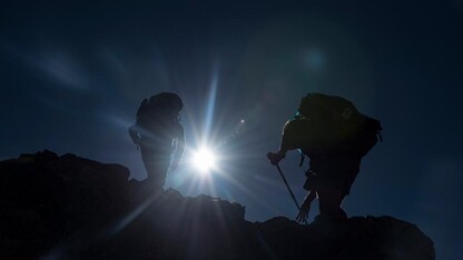 Mike Forsberg and Peter Stegen reach the summit of Grays Peak in Colorado. The duo is featured in the NET Television-produced documentary, "Follow the Water."