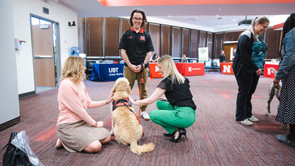 Neely and four-legged friend building community on campus