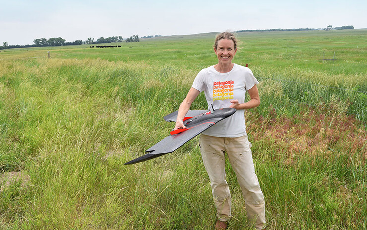 University of Nebraska–Lincoln graduate student Amanda Sanford gets ready to release an eBee SQ agricultural drone at the Barta Brothers Ranch near Ainsworth, Nebraska.