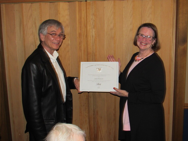 Jane Hanson received a Mensa Foundation award for service from Wes Shaw, local secretary of the Nebraska-Western Iowa Mensa program.