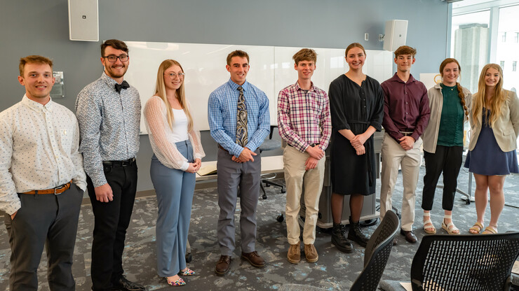 Newest Alpha Gamma Chapter inductees pose with past officers. From left are Jacob Hillis, Nathan Starr, Sam Berghuis, Thomas Henry, Willis Hanneman, Elaina Madison, Ridge Gersberger, Katrina Webster and Emma Kuss. | Photo courtesy of Luqi Li