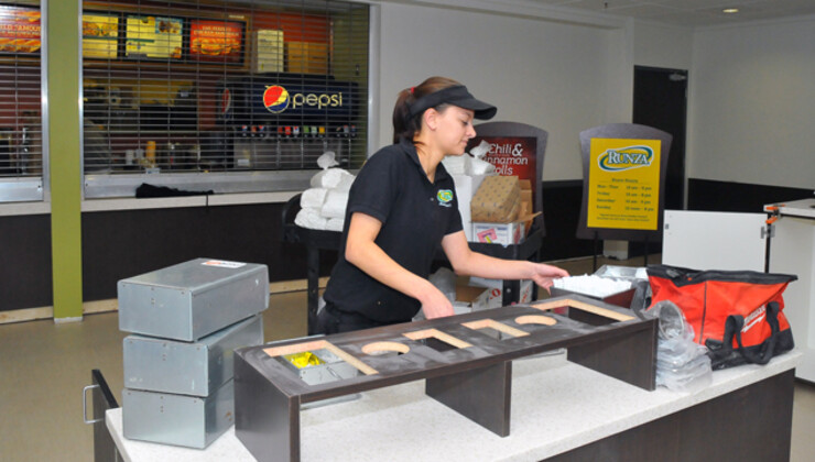 Taylor Ehrman, assistant manager, works inside the redesigned Runza restaurant in the Nebraska Union on Jan. 13.