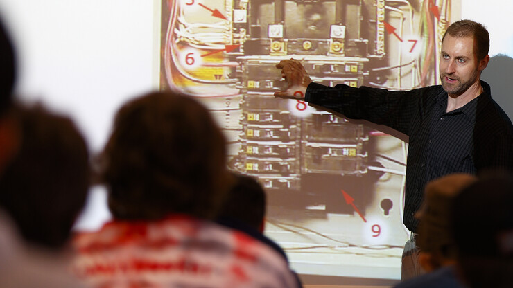 Curtis Tomasevicz discusses an Introduction to Electrical Engineering II concept with students in the Walter Scott Engineering Center on Feb. 5. The former Husker and Olympic gold medal winner is now teaching and conducting sports-related research at Nebraska.
