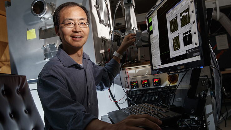 Photo of Xiaoshan Xu in his lab