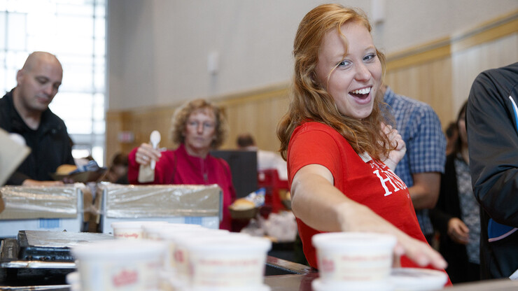 Elizabeth Tyler helps hand out ice cream during the universitywide picnic on Sept. 25.