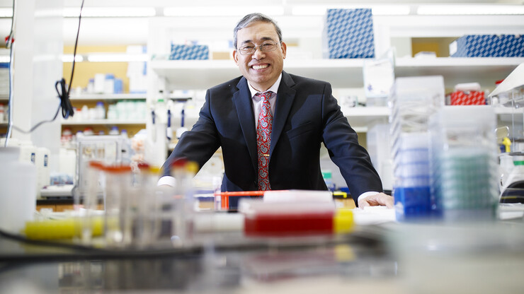 Photo of Qingsheng Li in his lab