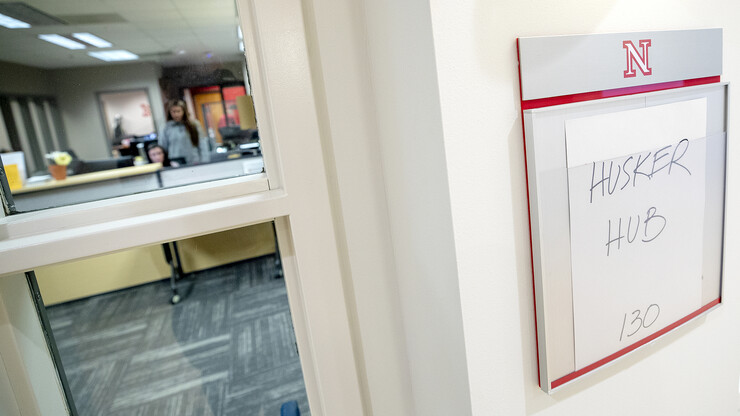 Temporary signs mark the Husker Hub's location in Pound Hall. The space opened March 8.