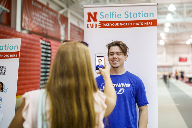 Ryan Lawton of Tampa Bay, Florida, has his photo taken by his mom for his N Card. 