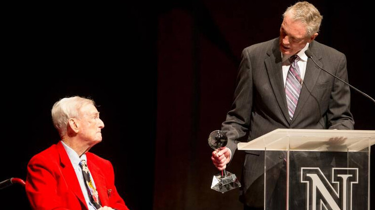 Former Huskers football head coach Tom Osborne (right) presents a special Lifetime Achievement Award to Dick Herman during the April 12 awards banquet. Herman was honored for his long-time support to the Huskers and their academic support and recognition efforts.