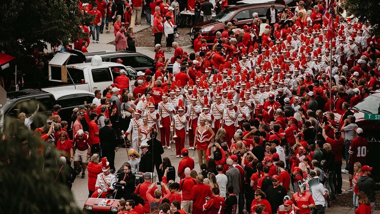 Law is among 32 engineering students in the Cornhusker Marching Band, seen here as it marches down Stadium Drive before the Sept. 8 Nebraska football game.