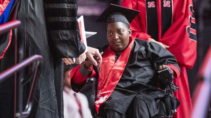 Amori Strong receives her Bachelor of Arts. Strong, who has cerebral palsy, moved to California in 2018 to access a broader network of medical services and completed her degree online. She and her friends raised money online so she could attend graduation and see her brother. 