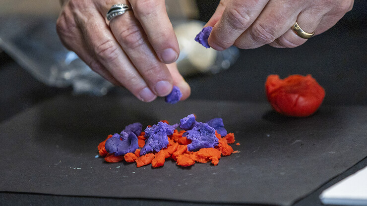 Annie Mumgaard uses various colors of modeling clay to represent how metamorphic rock is made.