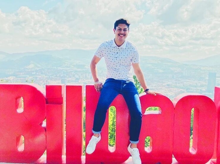 Former Gilman Scholar Miguel Avila Garcia poses with a Bilbao sign during his education abroad program in Bilbao, Spain, in summer 2019.