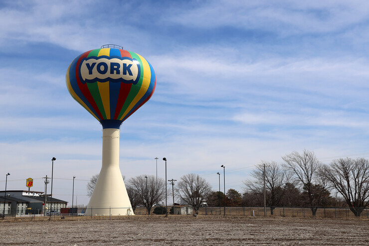 The multi-colored York water tower