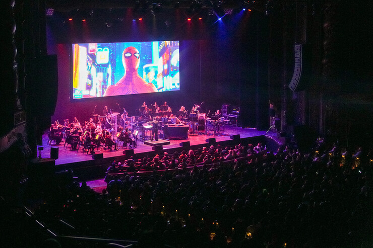 "Spider-Man: Into the Spiderverse" plays onstage behind a full orchestra.