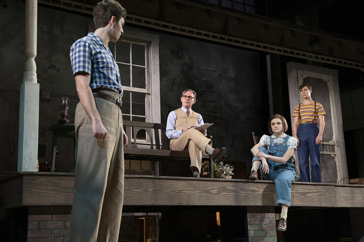 Four actors appear onstage in "Harper Lee's To Kill a Mockingbird."