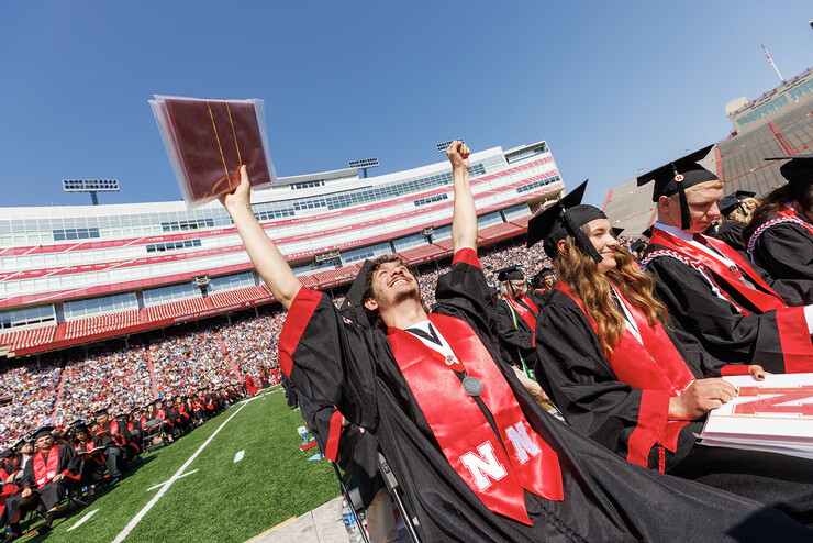 Stephen Yaghmour celebrates after receiving his Bachelor of Science in Chemical Engineering during the undergraduate commencement ceremony May 20 at Memorial Stadium.