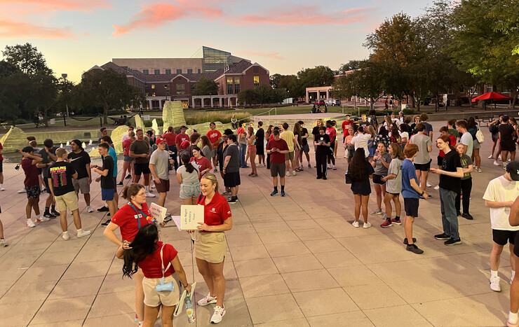 More than 100 students gathered for the night tour near Broyhill Fountain.