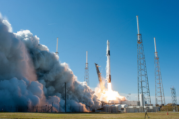 A SpaceX Falcon 9 rocket with the Dragon cargo module lifts off at Cape Canaveral in December 2019.
