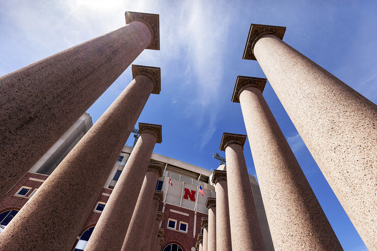 The 24 columns on the east side of Memorial Stadium each weigh an estimated 18,000 pounds (nine tons) and are about 22 feet tall. They are made of granite from Colorado and once adorned the Burlington train station in Omaha.