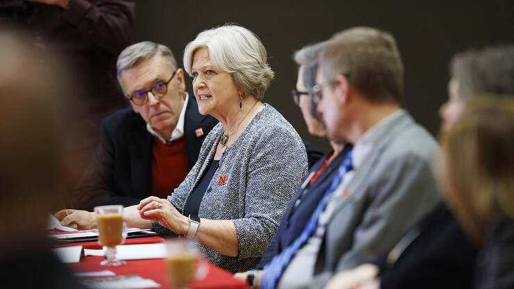 Katherine Ankerson, executive vice chancellor, talks as Chancellor Ronnie Green (left) and other administrators listen during the experiential learning discussion.