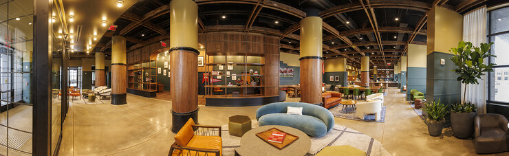 Panoramic view of the lobby of the Scarlet Hotel.