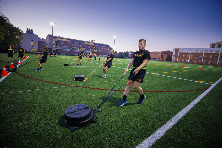 Matt Toland and other senior ROTC cadets drag 45 pound sleds across the Mabel Lee Fields turf as part of the Army Combat Fitness Test. After a long week of covering Big Red Welcome events, Nebraska’s Craig Chandler was up at 6 a.m. on Aug. 22, starting the semester with the cadets. 