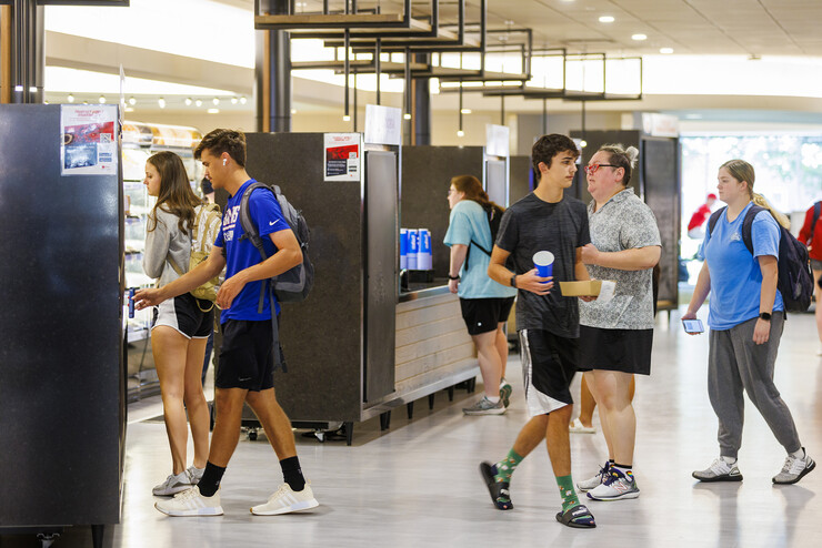 Students approach a pick-up counter in Selleck Food Court.