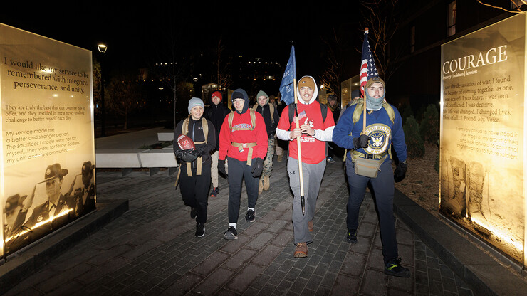 Students, veterans and volunteers start the 2022 Things They Carry Ruck March by the university's new Veterans' Tribute site on the morning of Nov. 16.