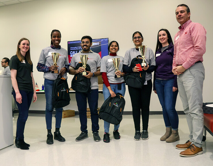 The winning team of the Battle of the Food Scientists takes a photos with the competition judges. Pictured are (from left) Nicolle Kaliff, Sedoten Ogun, Prabhashis Bose, Sayantini Paul, Urvinder Kaur Sardarni, Ava Petersen and Terry Howell