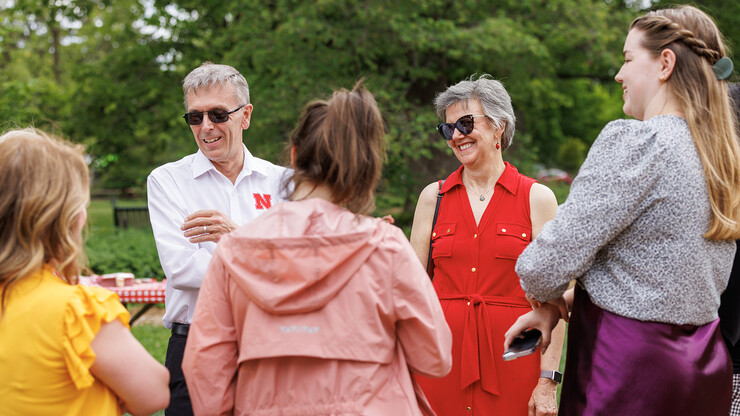 Ronnie and Jane Green smile as they greet fellow Huskers during the open house.