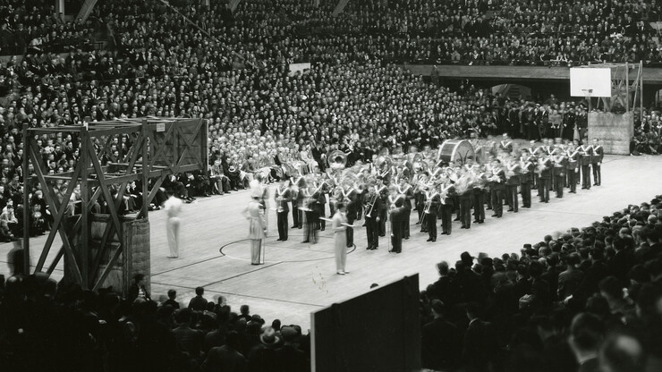 Detail of the Cornhusker Marching Band, including the wooden frames that supported the basketball hoops and backboards.