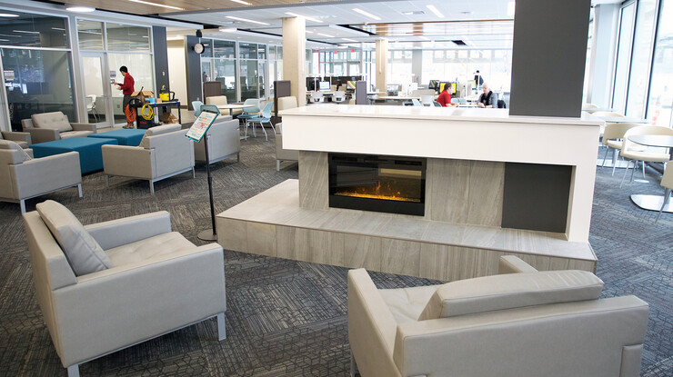 The Learning Commons in Love Library offers a variety of study and collaboration spaces, including a fireplace.