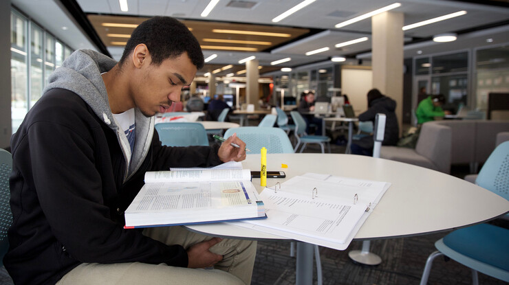 Marco Pinto, a junior biological sciences major, reads in UNL's new Adele Coryell Learning Commons on Nov. 11. The new, $10 million, 30,000-square-foot space opened with the start of UNL's spring semester.