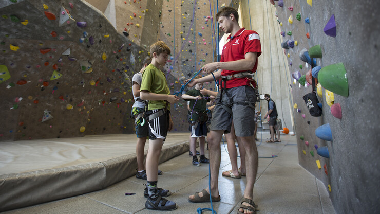 Chris Duerschner demonstrates rope tying during a training session at UNL's Outdoor Adventures Center on June 7.