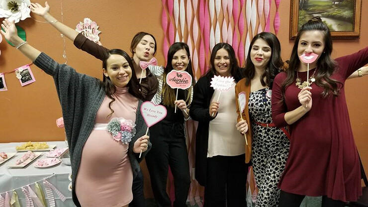 Family is a priority for Selma De Anda Gallegos. She is shown here (third from left) posing with relatives during a baby shower.