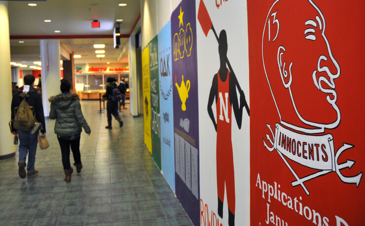 About 30 Recognized Student Organizations painted designs on drywall that encloses construction areas within the Nebraska Union. The project was organized by the Nebraska Union's Mandy Humle and Ryan Lahne. (© 2013, The Board of Regents of the University of Nebraska. All rights reserved.)