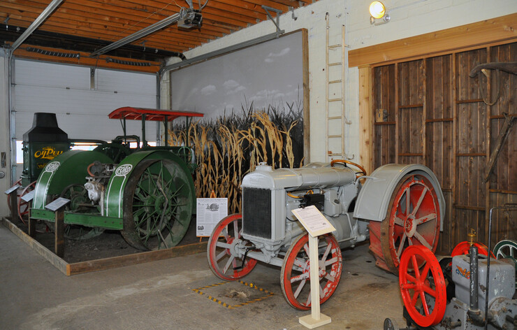 Two recent exhibit renovations in the Larsen museum. The display at right is made to look like the inside of a barn and sits behind a new exhibit that resembles the outside of the same barn.