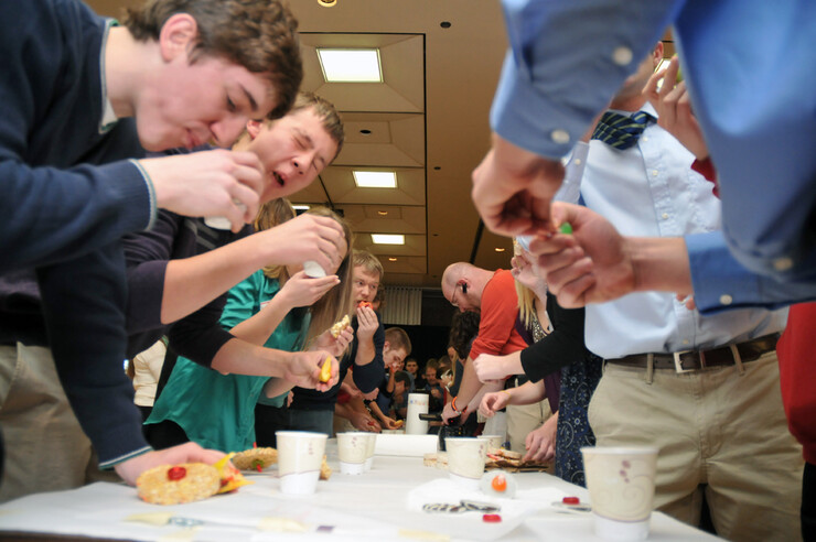 Students race to eat their edible vehicles at the close of the 2012 Incredible, Edible Vehicle Competition.
