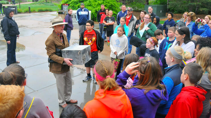 In this May 12, 2014, file photo, Mark Griep, associate professor of chemistry, shows the Avery Hall cornerstone time capsule to a group of students from York Middle School.