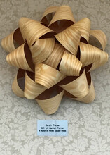 A new bow sculpture, donated by Harriet Turner, is on display in the Kawasaki Reading Room.